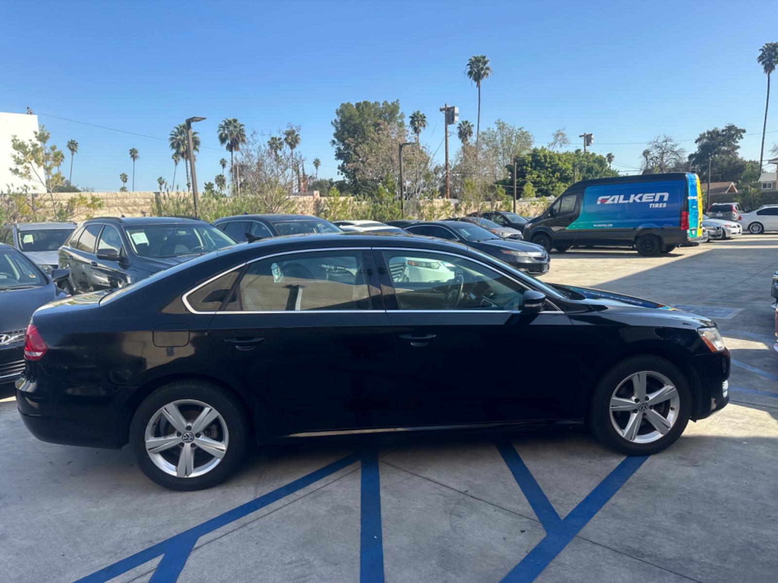 2013 Black /BLACK Volkswagen Passat (1VWBP7A30DC) , located at 30 S. Berkeley Avenue, Pasadena, CA, 91107, (626) 248-7567, 34.145447, -118.109398 - Low Miles!! Crown City Motors is a used “Buy Here Pay Here” car dealer in Pasadena CA. “Buy Here Pay Here” financing, means that when you purchase your vehicle from our dealership, that you make the payments to the dealership as well. We do not need the banks approval to get you approved - Photo #6